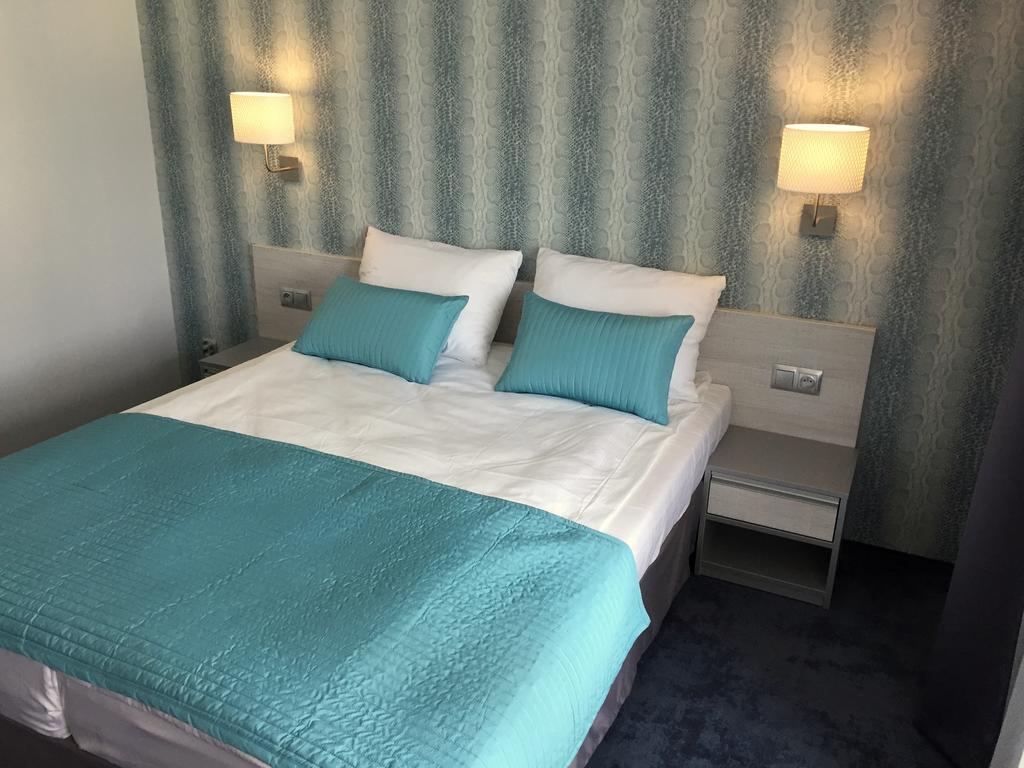 Hotel Perlowy Okuninka Rum bild